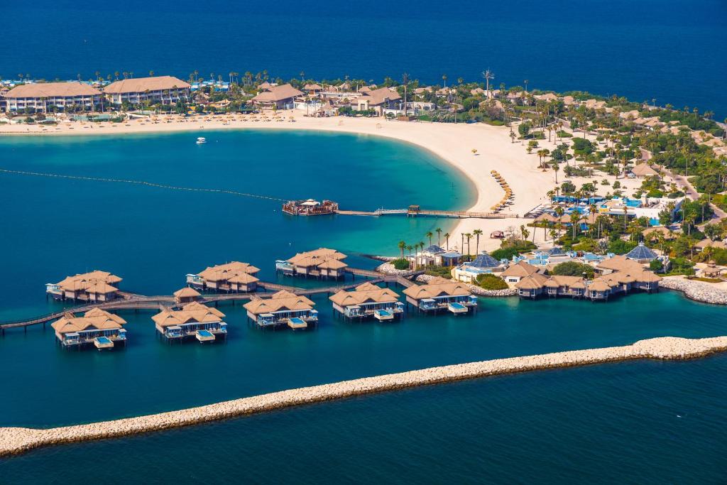 Banana Island from the air: the beach, the lagoon and villas over the water