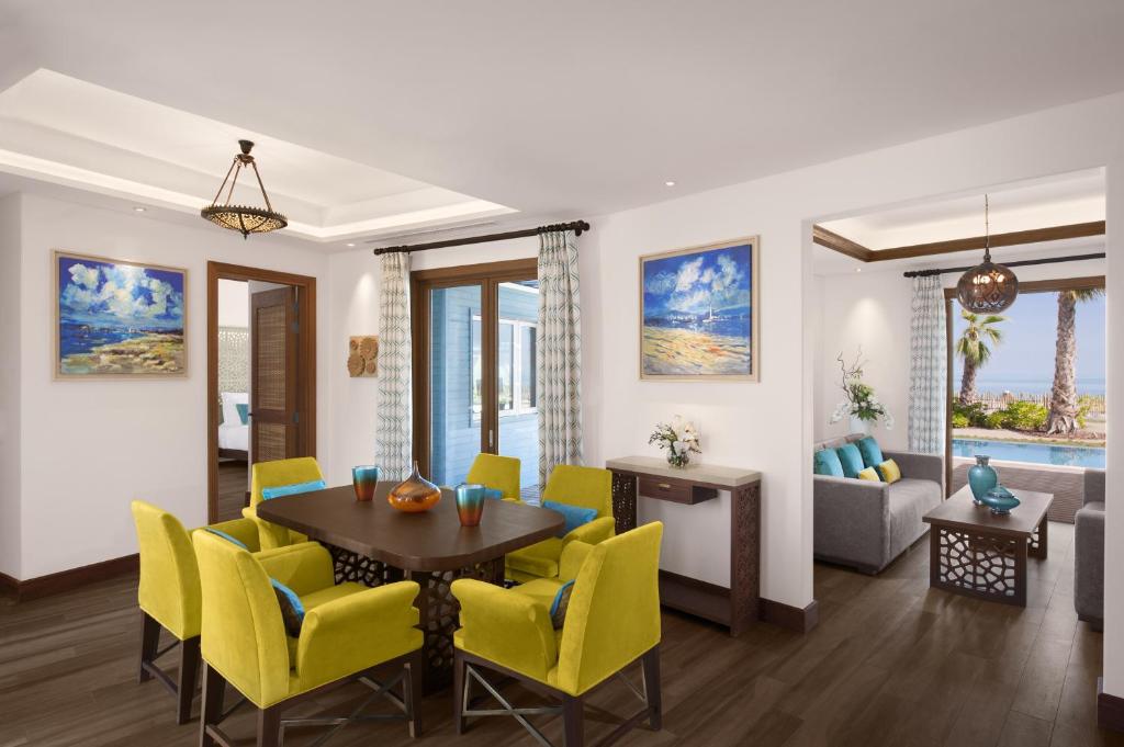 A bright living and dining room in a villa